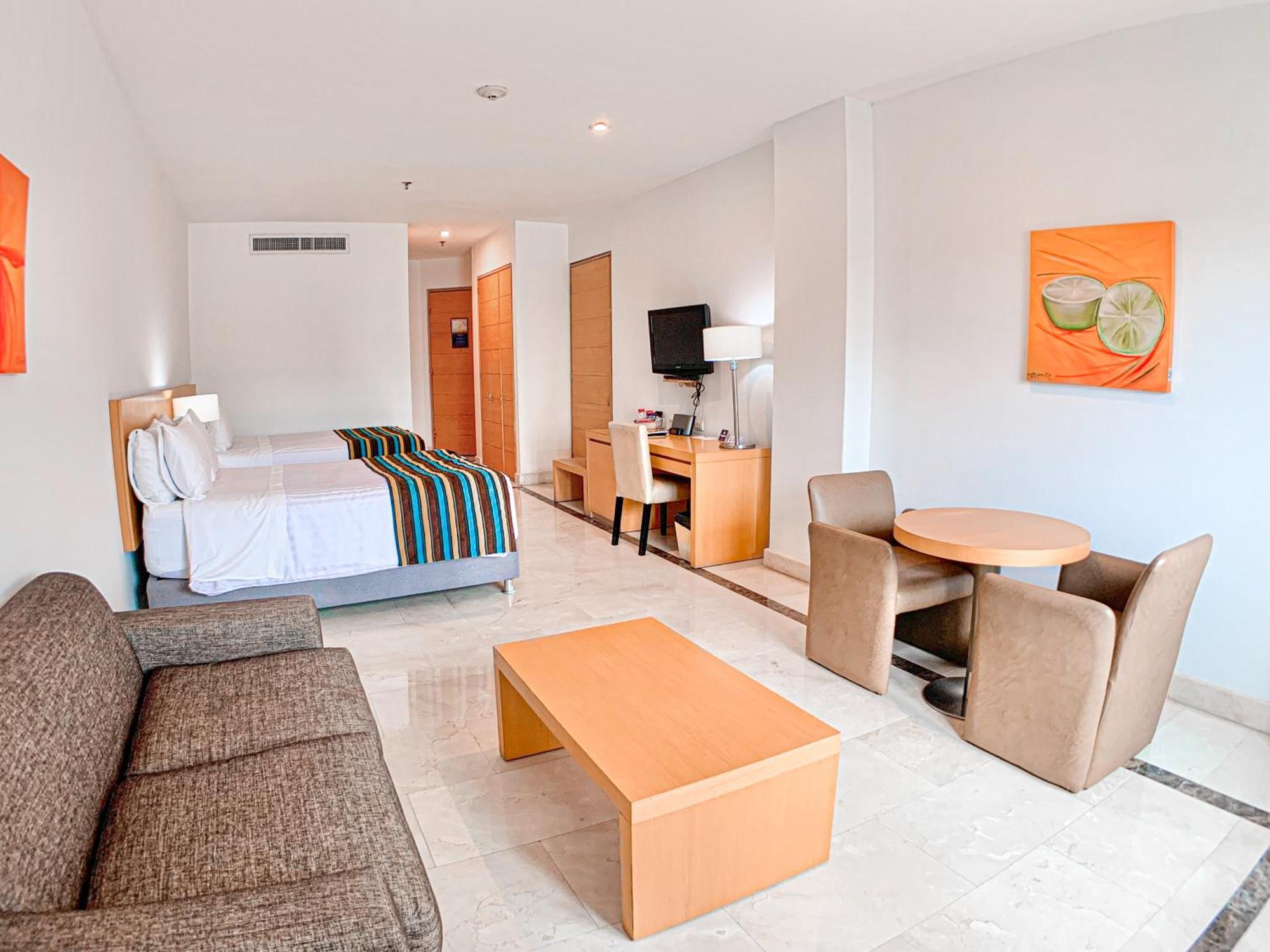Hotel Dann Carlton Barranquilla Y Centro De Convenciones Kültér fotó A room at the hotel
